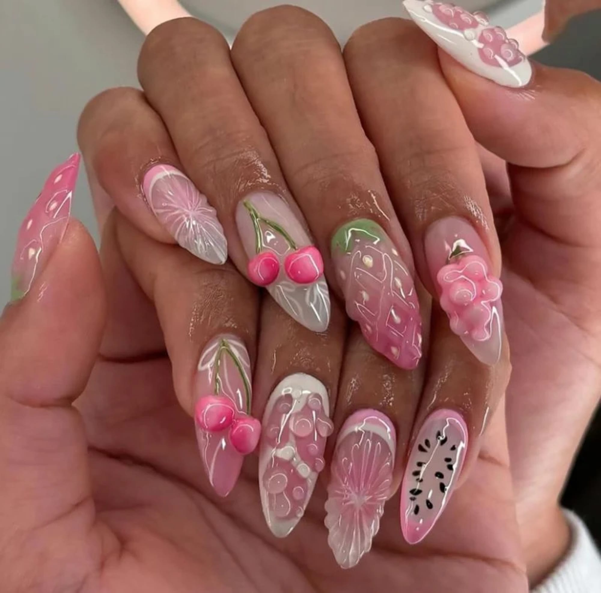 Almond nails with floral and berry art