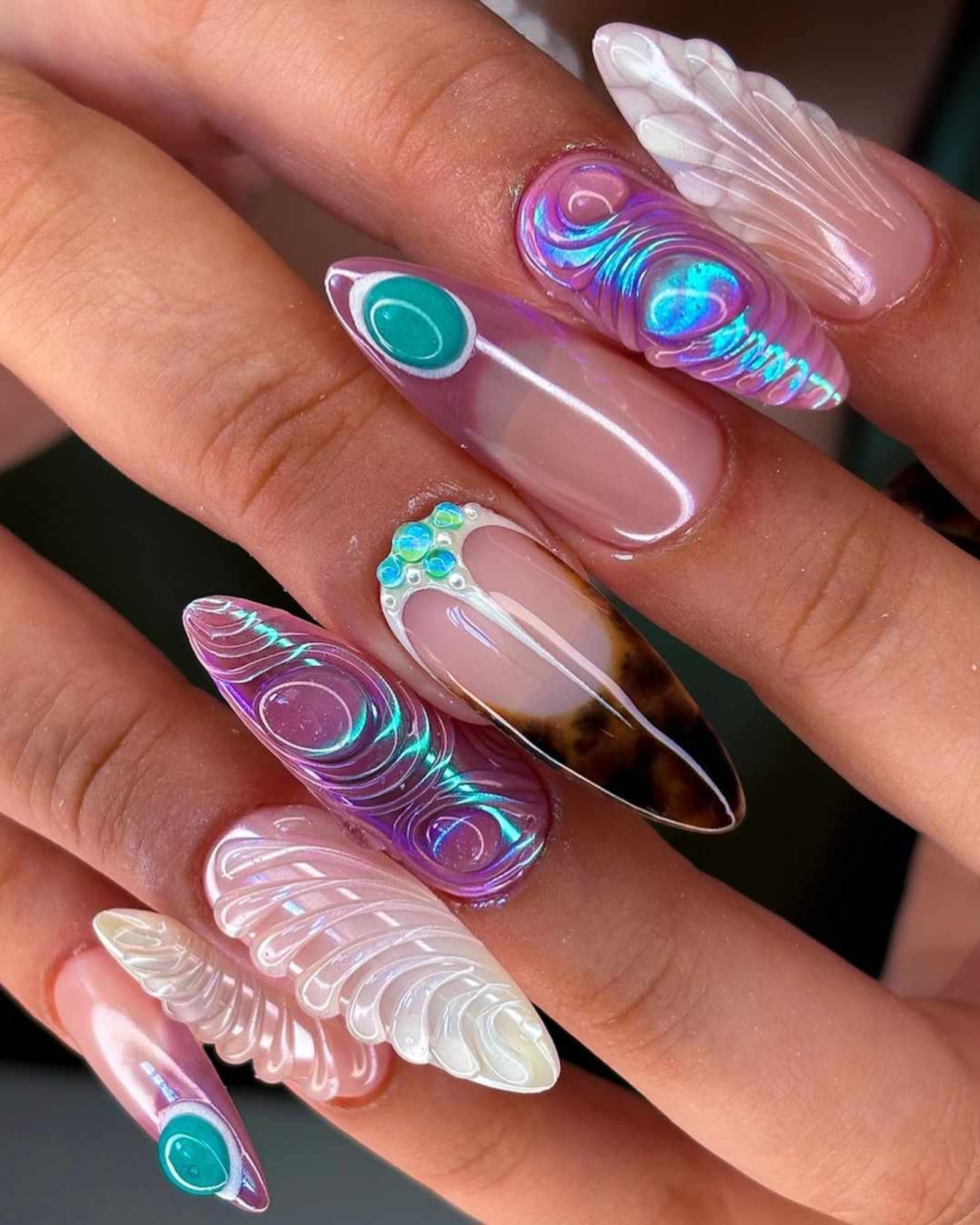 Peacock feather nail art
